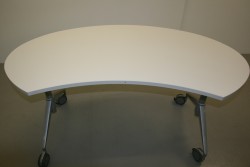Gebrauchter, günstiger Wiesner Hager Schreibtisch auf Rollen.